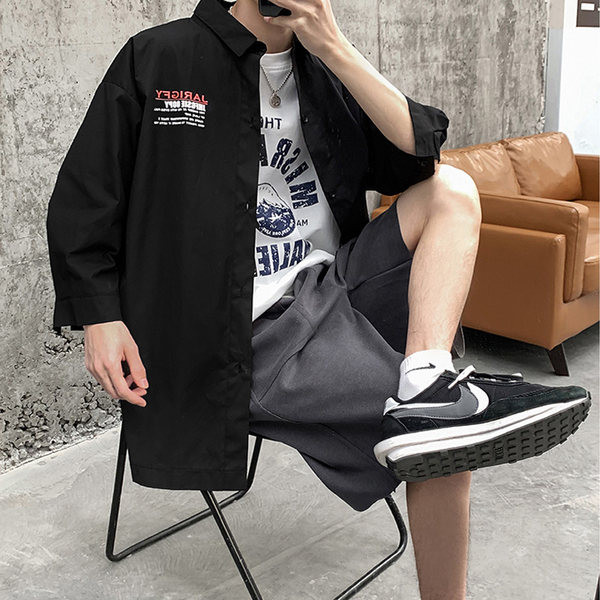 Широк модел риза с дълъг ръкав и щампа на гърба