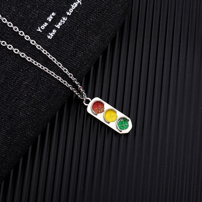 Current men`s steel chain with traffic light pendant