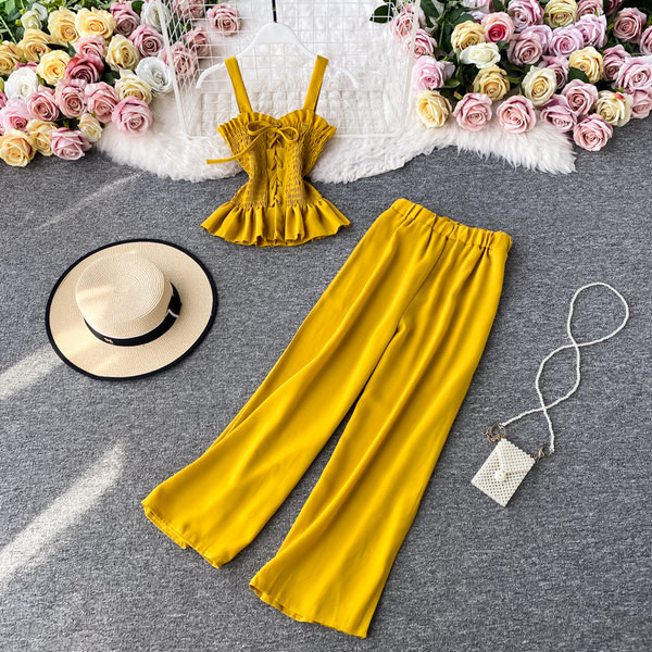 Moderan ženski komplet bez rukava i dugih ravnih hlača