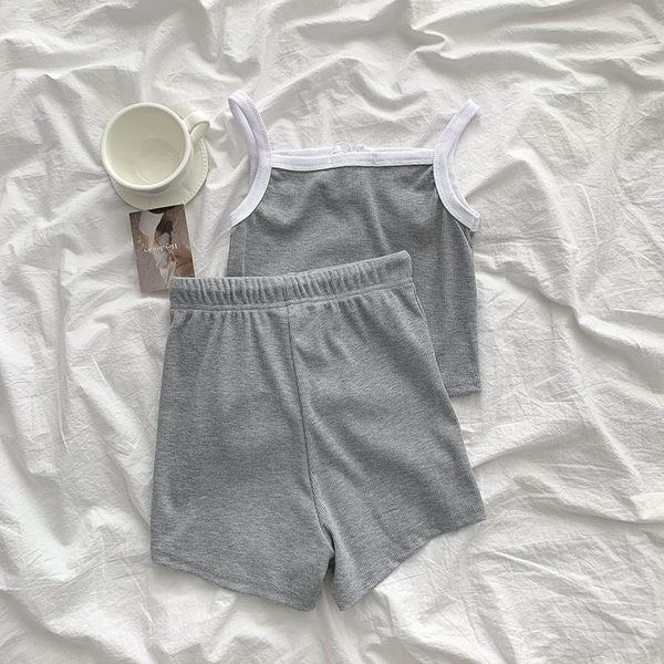 Dnevni ženski komplet iz dva dijela sa vezama