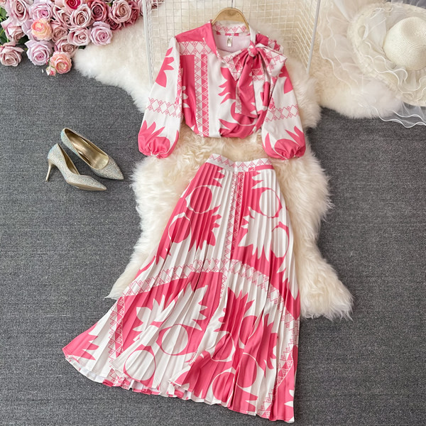 Ženski elegantni dvodijelni komplet s plisiranom suknjom