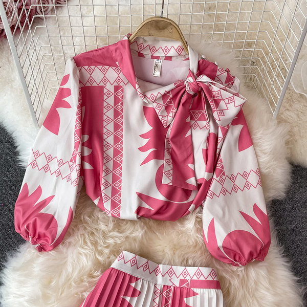 Ženski elegantni dvodijelni komplet s plisiranom suknjom