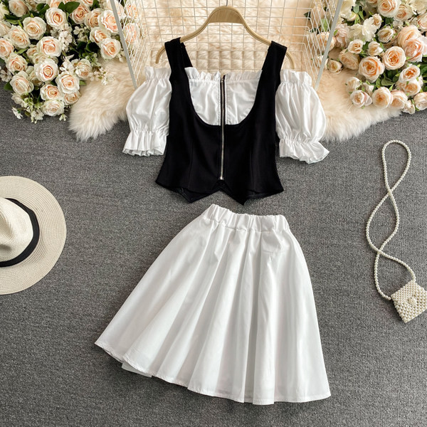 Elegantan ženski komplet u bijeloj boji iz dva dijela