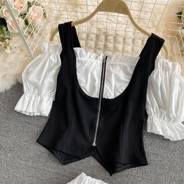 Elegantan ženski komplet u bijeloj boji iz dva dijela