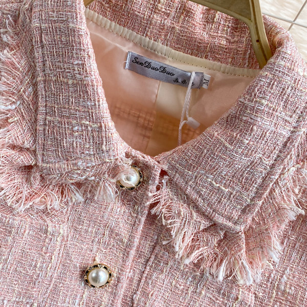 Ženski komplet iz dva dela je roze i plave boje