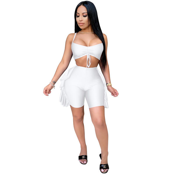 Aktualan ženski komplet - pripijene hlače s resicama i poprsje