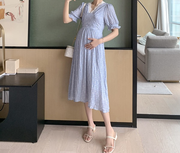 Elegantna ženska elastična haljina za trudnice