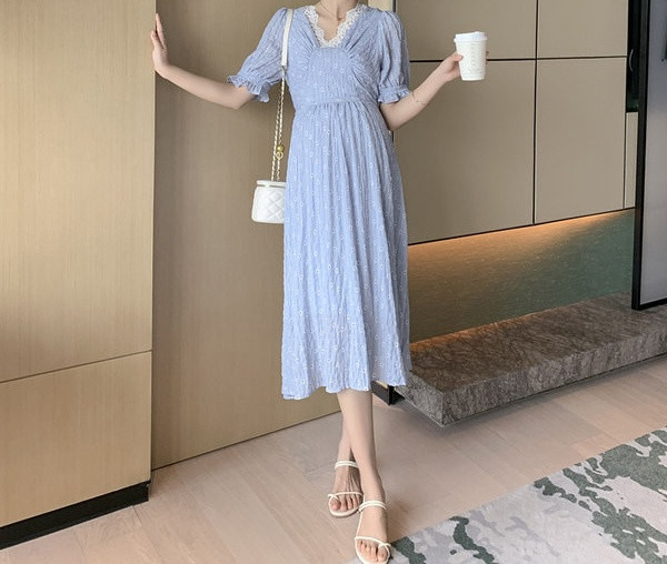 Elegantna ženska elastična haljina za trudnice