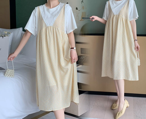 Moderna ženska haljina širokog jednobojnog modela za trudnice