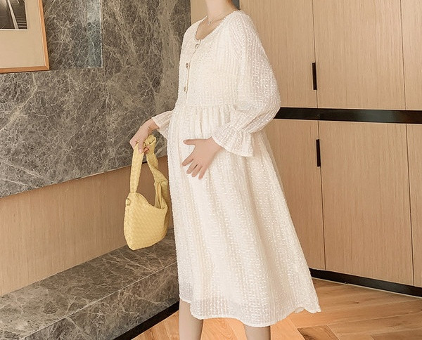 Elegantna ženska haljina s ovalnim izrezom i dugim rukavima za trudnice