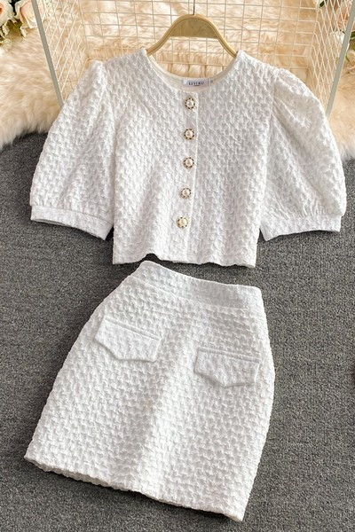 Ženski komplet u beloj boji iz dva dela