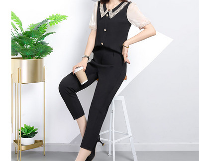 Sieviešu komplekts no divām daļām ar pogām