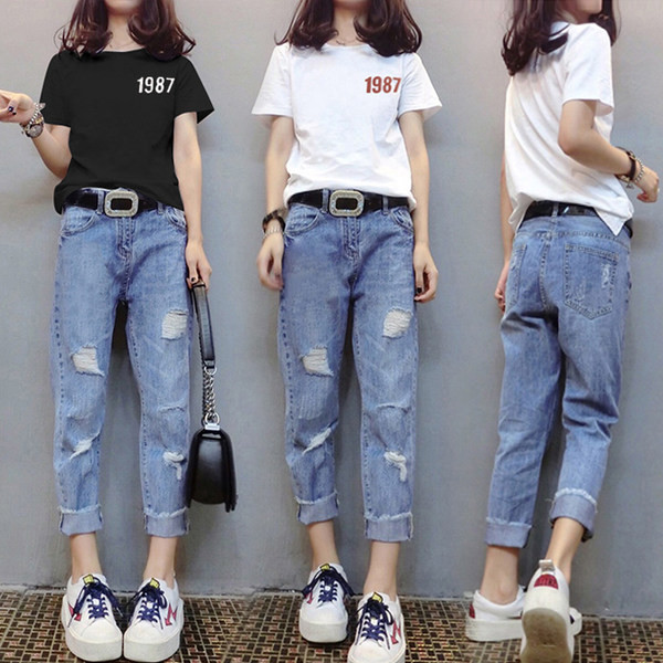 Moderan ženski komplet traperica i majice