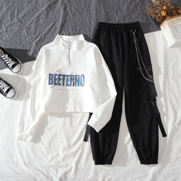 Ležeran proljetno-jesenski komplet kratke bluze i širokih hlača s džepom