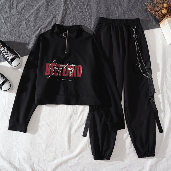 Ležeran proljetno-jesenski komplet kratke bluze i širokih hlača s džepom