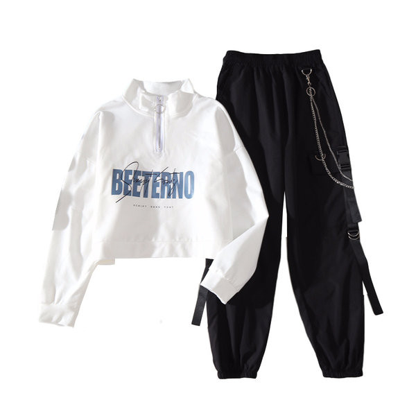 Ležeran proljetno-jesenski komplet kratke bluze i širokih hlača s džepom