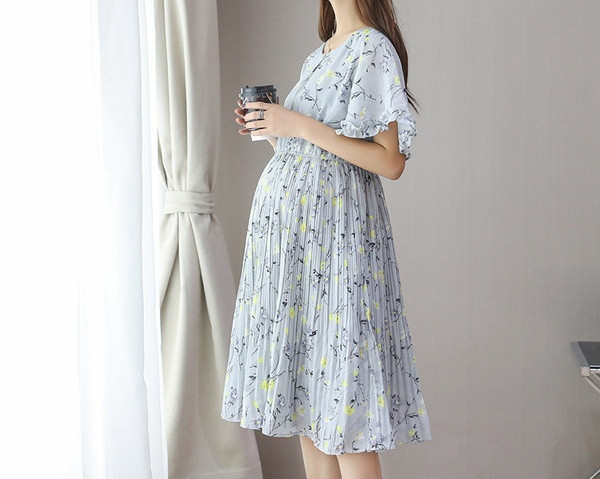 Elegantna ženska haljina s cvjetnim uzorkom i okruglim izrezom za trudnice