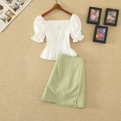 Aktualan ženski komplet - kratka suknja i bluza