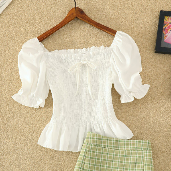 Aktualan ženski komplet - kratka suknja i bluza