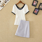 Ženski komplet u retro stilu koji se sastoji od dva dijela - suknje i majice