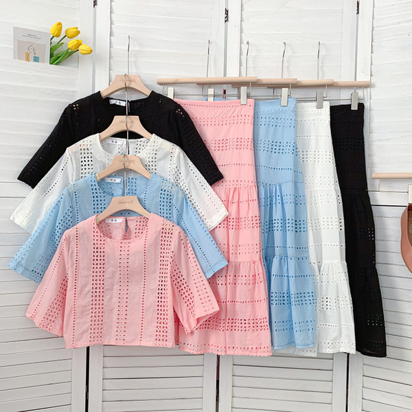 Novi model ljetnog kompleta kratke bluze sa izrezanom suknjom