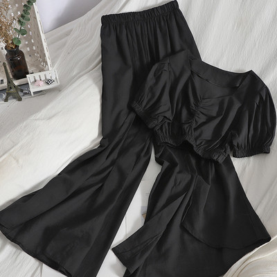 Sieviešu pavasara komplekts no īsas blūzes un biksēm