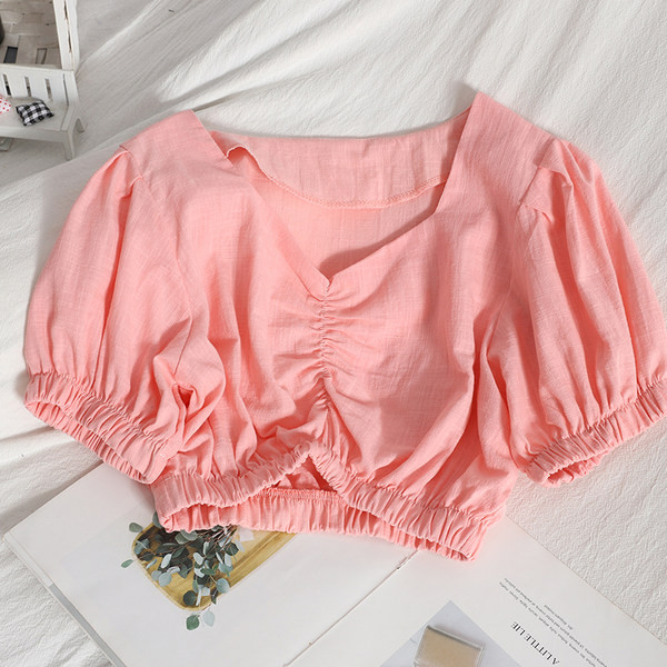 Sieviešu pavasara komplekts no īsas blūzes un biksēm