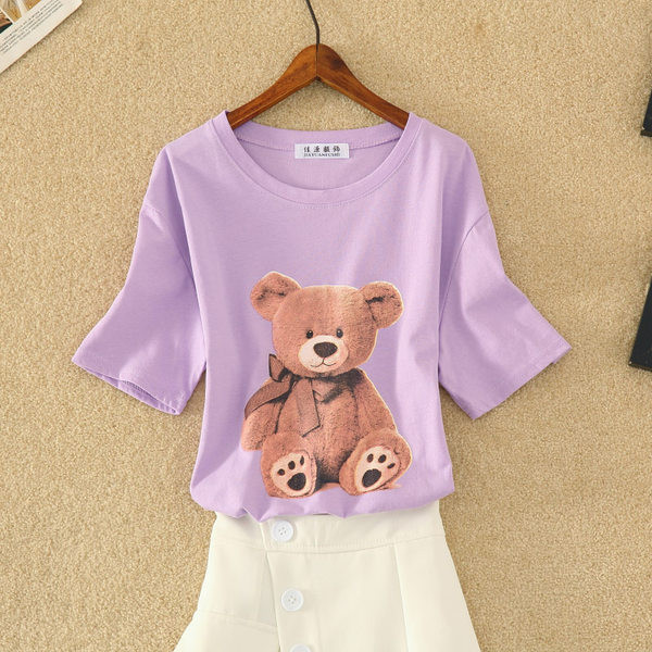 Sieviešu T-kreklu komplekts ar aplikāciju un svārkiem