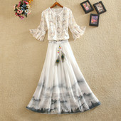 Ženski komplet duge suknje i bluze sa cvjetnim motivima