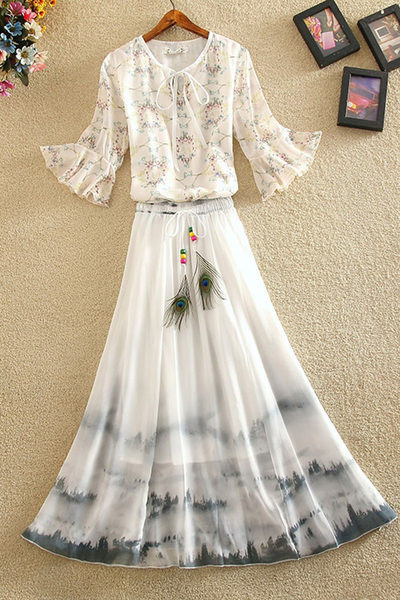 Ženski komplet duge suknje i bluze sa cvjetnim motivima