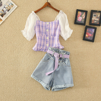 Ženski komplet kratkih traperica i bluze