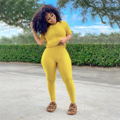 Sportsko-casual ženski komplet s majicom i tajicama u različitim bojama