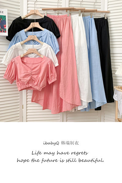 Novi model ljetnog kompleta - kratka bluza i krojena suknja