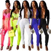 Moderan ženski komplet od dva dijela - hlače i kratka jakna bez gumba