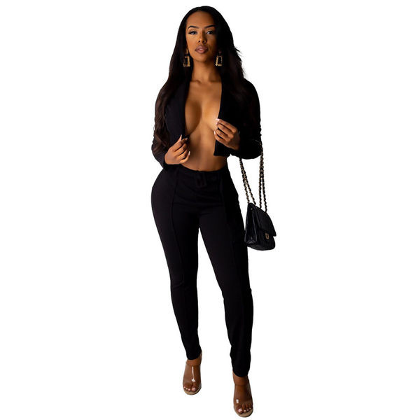 Moderan ženski komplet od dva dijela - hlače i kratka jakna bez gumba