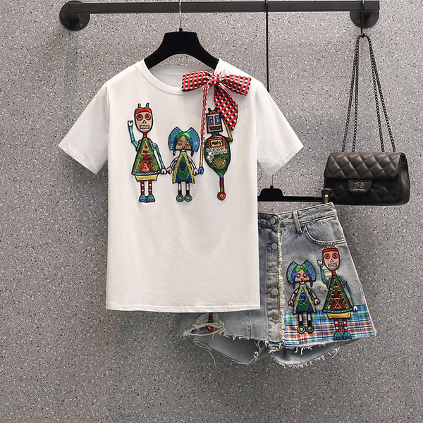 Sieviešu blūzes un džinsu komplekts ar izšuvumiem un fliteriem