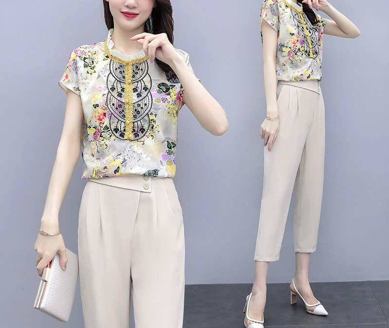 Novi model ženskog kompleta - bluza i hlače na asimetrično kopčanje