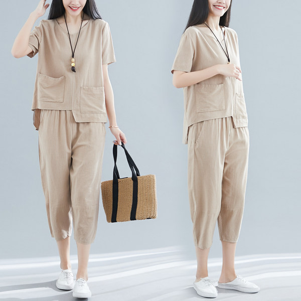 Vasaras komplekts sievietēm no asimetriskas blūzes ar kabatām un 7/8 biksēm