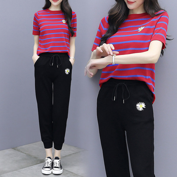 Dnevni set majice i sportskih hlača s aplikacijom tratinčice