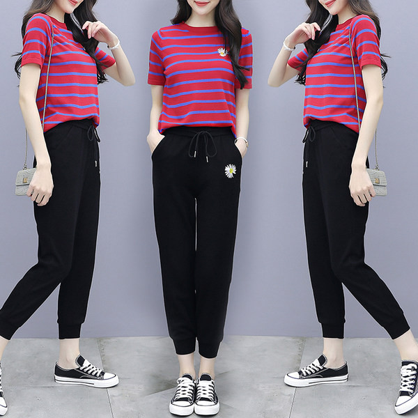 Dnevni set majice i sportskih hlača s aplikacijom tratinčice