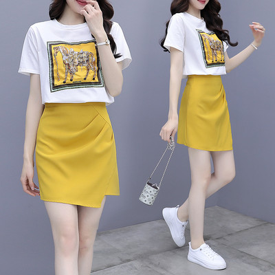 Sieviešu ikdienas komplekts ar aplikācijām un asimetriskiem svārkiem