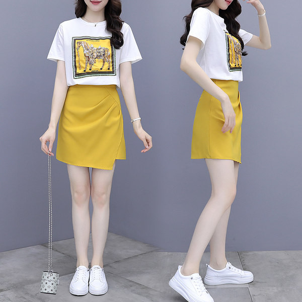 Sieviešu ikdienas komplekts ar aplikācijām un asimetriskiem svārkiem