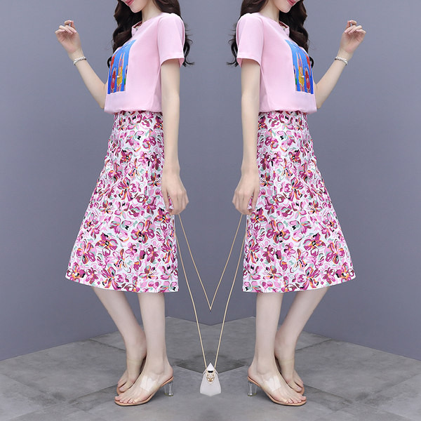 Novi model ženskog kompleta sa uzorkom u boji i ovalnim izrezom