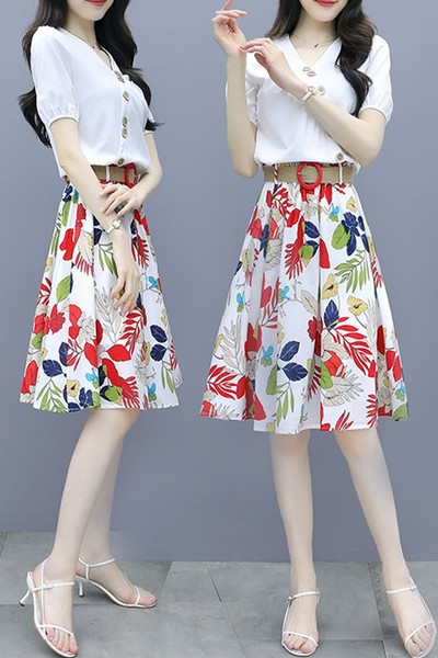 Ljetni komplet pripijene košulje i suknje s cvjetnim uzorkom