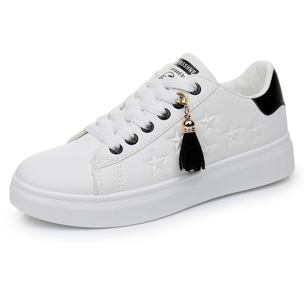 Jauns balto kedu modelis meitenēm ar saitēm un pušķi