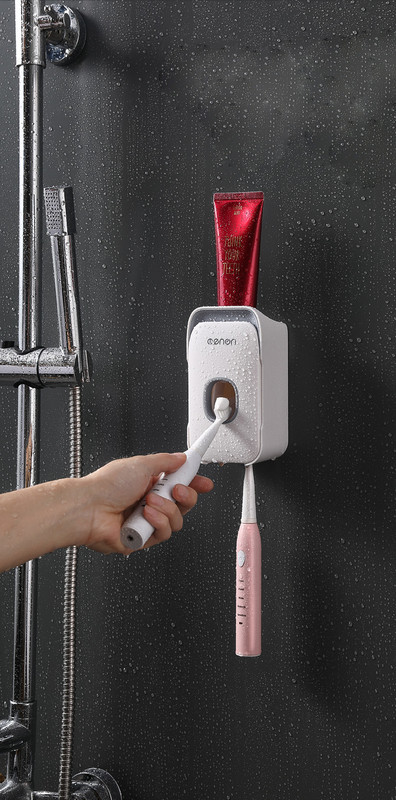 Dantų pastos dozatorius su dantų šepetėlio laikikliu