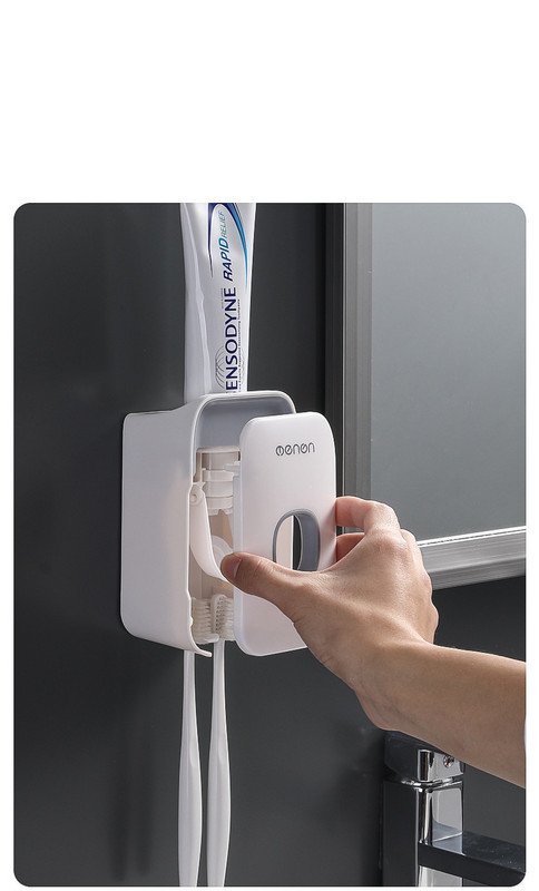 Dantų pastos dozatorius su dantų šepetėlio laikikliu