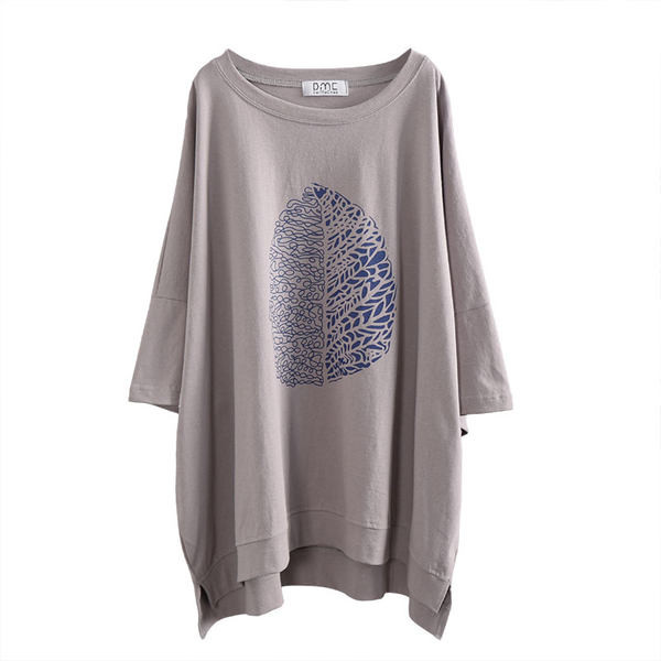 Asimetrični model s 3/4 rukavima i aplikacijom