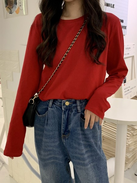Jednobojna ženska bluza dugih rukava i okruglog dekoltea
