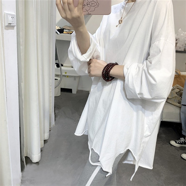 Široka ženska bluza dugih rukava bijele boje